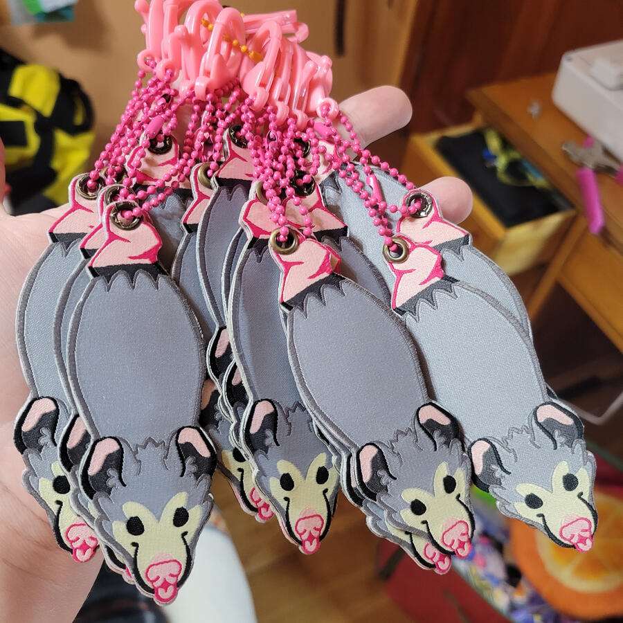 Hanging Opossum Jet Tag keychains; V1; findings sourced and attached in-house