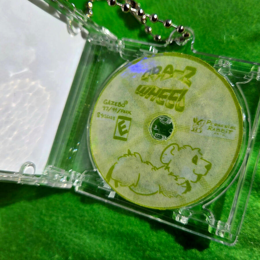 [ORIGINAL ART] video game keychain inside. disk removable.