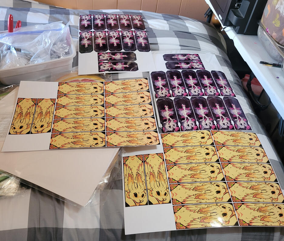 Lots of bookmarks, glue drying and waiting to get cut.